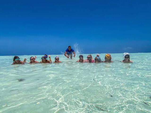 People lying in water
